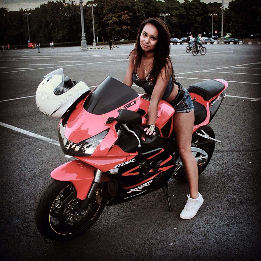 Brunettes on a motorcycle in Samara