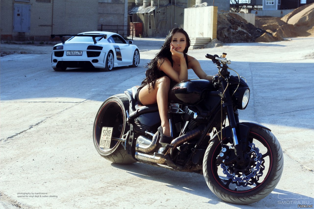 Sexy model Brunettes on a motorcycle in Samara